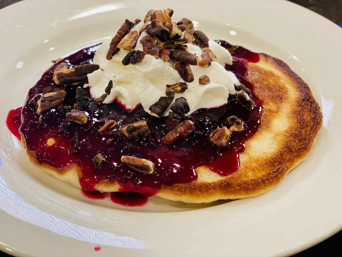 Pancakes with Blueberry Syrup and Pecans