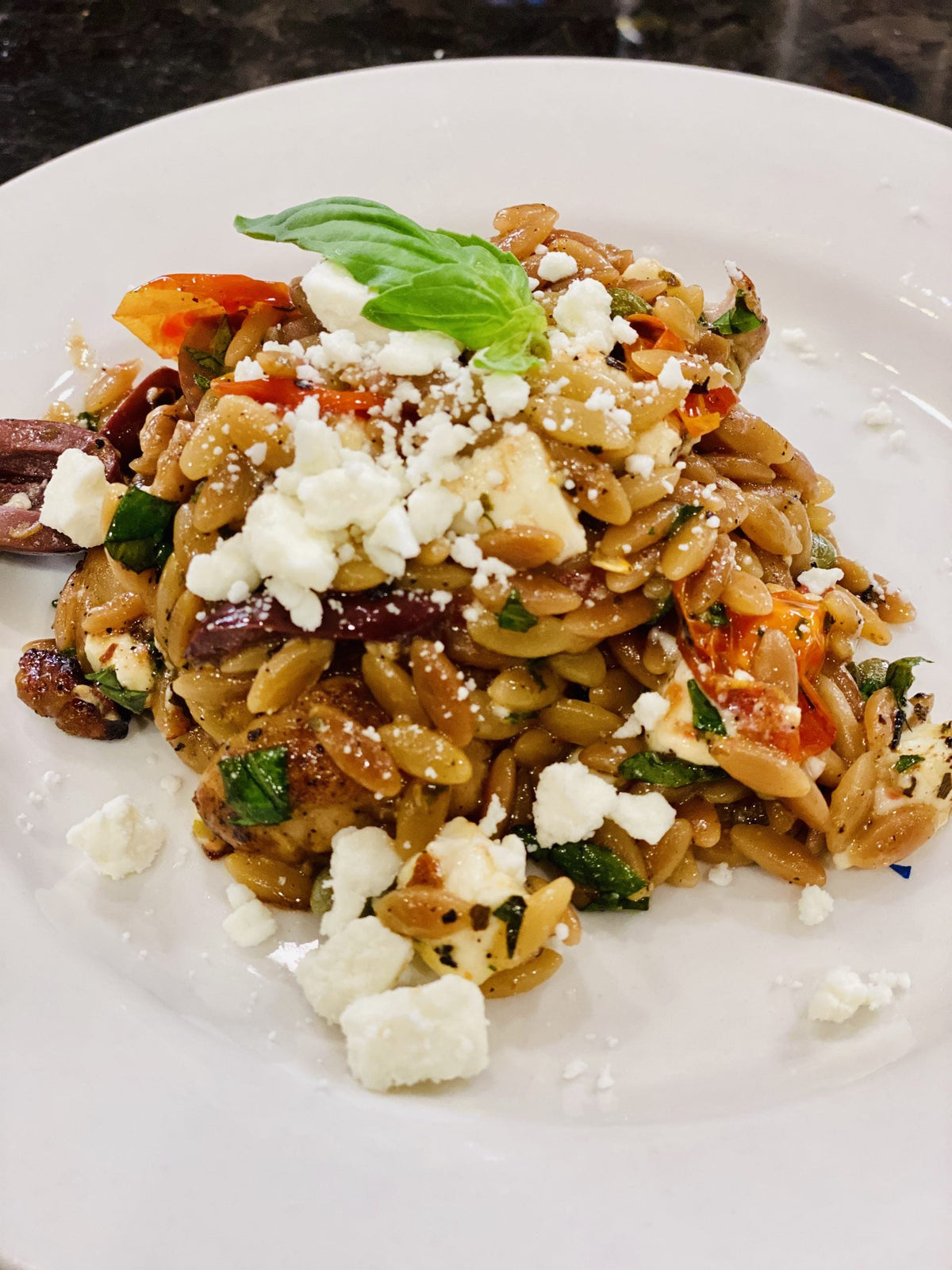 Chicken Thighs with Tomato, Orzo, Olives, and Feta